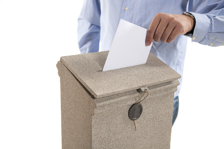 man putting letter in mailbox.Close upの写真素材