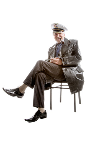 Portrait of old sailor man in  hat  with pipe  on white backgroundの写真素材