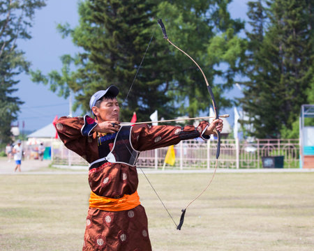 Competitions in shooting from a sports bow in Siberia. Mongolian competitions in archery. The...