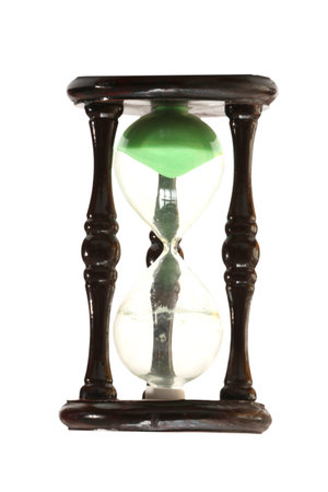 Hourglass with green sand close-up