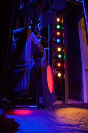 Light effects on stage created with theatrical lighting equipment and a smoke machineの写真素材