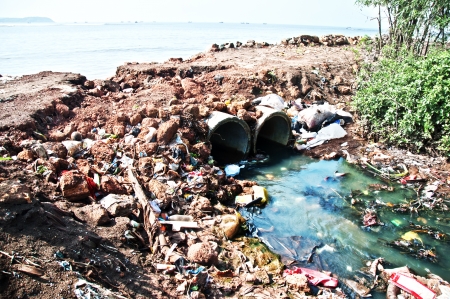 Toxic plastic sewer flowing into the seaの写真素材
