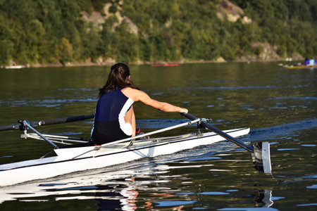 Canoe kayak Scull rowing team training. Aerial view,