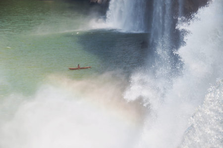 Kayaking  at a beautiful waterfallの写真素材