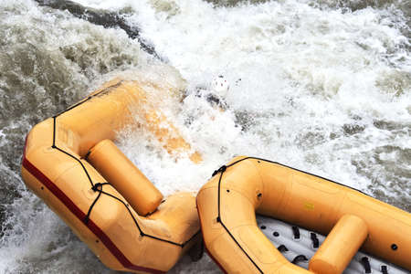 Rafting, boats stuck in a rapid. Whitewater rafting.の写真素材