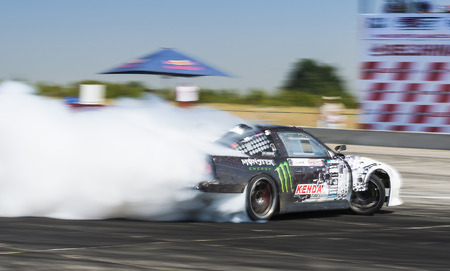 Vinnytsia,Ukraine-July 24, 2015: Rider  Dmytro Illyuk  on the car brand Nissan overcomes the track in the  Drift championship of Ukraine  on July 24,2015 in Vinnytsia, Ukraine.のeditorial素材