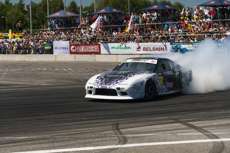 Lviv, Ukraine - Juny 7, 2015:  Rider Dmytro ILLYUK on the car brand Nissan overcomes the track in the championship of Ukraine drifting in Lviv.のeditorial素材