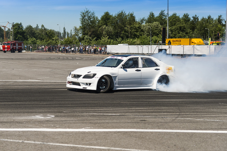 Lviv, Ukraine - June 6, 2015: Unknown rider on the car brand Nissan overcomes the track in the championship of Ukraine drifting in Lviv.のeditorial素材