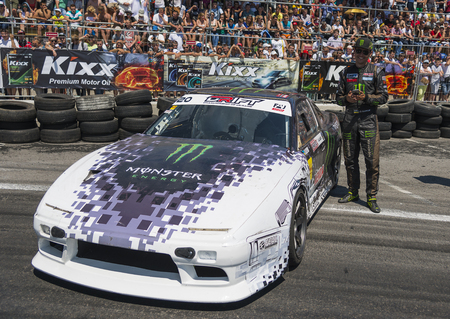 Lviv, Ukraine - Juny 6, 2015:  Rider Dmytro ILLYUK near his  car brand Nissan before  the championship of Ukraine drifting in Lviv, Ukraineのeditorial素材