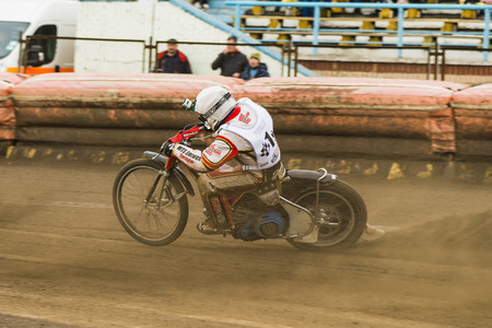 Rivne, Ukraine - 11 October 2015: Unknown rider overcomes the track at the Open Cup Speedway to the day of the city Rivneのeditorial素材