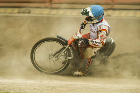 Rivne, Ukraine - 11 October 2015: Unknown rider overcomes the track at the Open Cup Speedway to the day of the city Rivneのeditorial素材