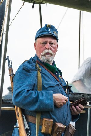 Snina, Slovakia - May 28, 2016: Military historical reconstruction battles of World War I Karpaty 1914/1916. Participant of event expects to begining reconstruction near Snina, Slovakia.のeditorial素材