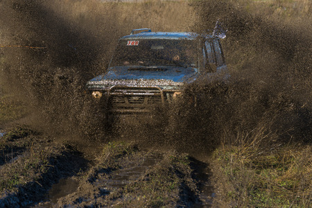 Lviv,Ukraine- December 6, 2015: Unknown rider on the off-road vehicle overcomes a route off road near the city of Lviv, Ukraineのeditorial素材