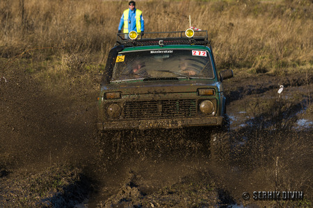 Lviv,Ukraine- December 6, 2015: Unknown rider on the off-road vehicle brand VAZ-NIVA overcomes a route off road near the city of Lviv, Ukraineのeditorial素材