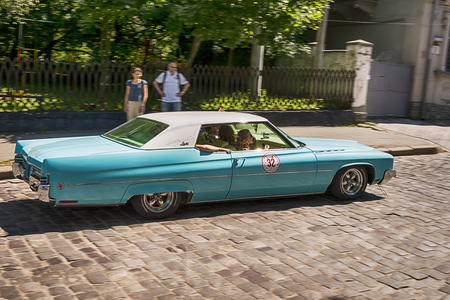 Lviv, Ukraine - June 4, 2017: Old retro car  BUICK ELECTRA 225 LIMITED with its owner and au unknown passengers taking participation in race Leopolis grand prix 2017, Ukraine.のeditorial素材