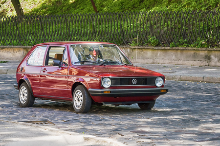 Lviv, Ukraine - June 4, 2017: Old retro car Volkswagen KAFER with its owner and au unknown passenger taking participation in race Leopolis grand prix 2017, Ukraine.のeditorial素材
