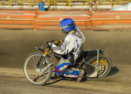 Rivne, Ukraine - 29 August 2015: Unknown rider overcomes the track at the Open Cup Speedway to the day of the city Rivneのeditorial素材
