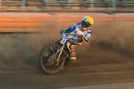 Rivne, Ukraine - 29 August 2015: Unknown rider overcomes the track at the Open Cup Speedway to the day of the city Rivneのeditorial素材