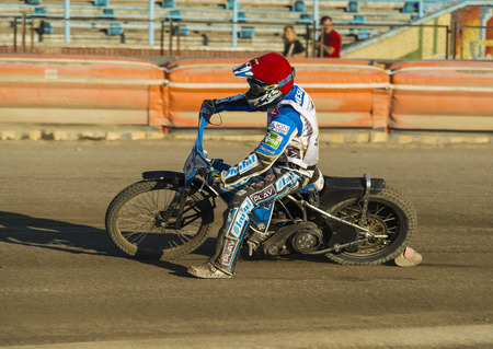 Rivne, Ukraine - 29 August 2015: Unknown rider overcomes the track at the Open Cup Speedway to the day of the city Rivneのeditorial素材