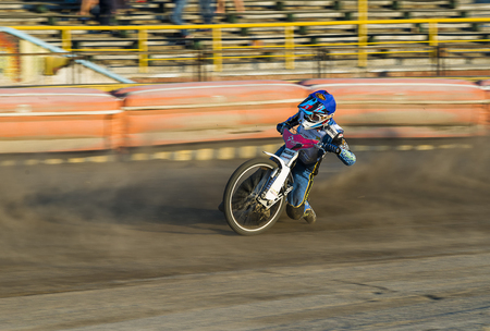 Rivne, Ukraine - 29 August 2015: Unknown rider overcomes the track at the Open Cup Speedway to the day of the city Rivneのeditorial素材