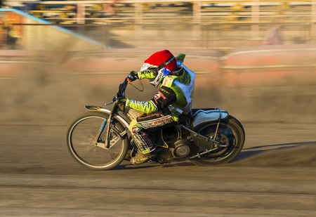 Rivne, Ukraine - 29 August 2015: Unknown rider overcomes the track at the Open Cup Speedway to the day of the city Rivneのeditorial素材