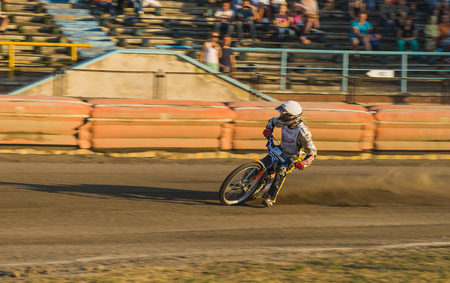 Rivne, Ukraine - 29 August 2015: Unknown rider overcomes the track at the Open Cup Speedway to the day of the city Rivneのeditorial素材