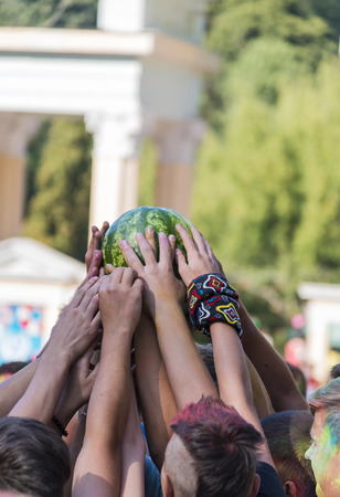 Lviv, Ukraine - August 30, 2015: People  have fun during the festival watermelon  in a city park in Lviv.のeditorial素材