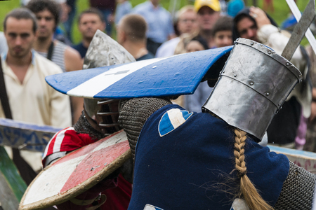 Urych, Ukraine - August 6,2016: Tustan Medieval Culture Festival in Urych, Western Ukraine, on August 6, 2016.Participants of the festival in knight armor arrange fightsのeditorial素材