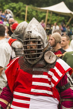 Urych, Ukraine - August 6,2016: Tustan Medieval Culture Festival in Urych, Western Ukraine, on August 6, 2016.Participant of the festival in knight armor prepares to fights.のeditorial素材