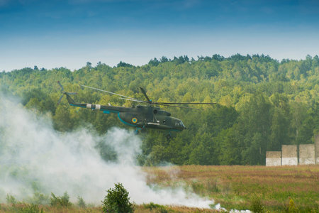 Lviv, Ukraine - July 6, 2016: Ukrainian-American joint military exercises near the Lviv rapid trident 2016.Ukrainian Air Force helicopter Mi 8 leaves the drop zone   Lviv.Ukraine.のeditorial素材