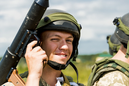 Lviv, Ukraine - July 6, 2016: Ukrainian-American joint military exercises near the Lviv rapid trident 2016. Commando with granade luncer after atack at simulated enemy positions  Lviv.Ukraine.のeditorial素材