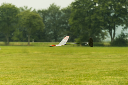 Radio-controlled glider coming in to landのeditorial素材