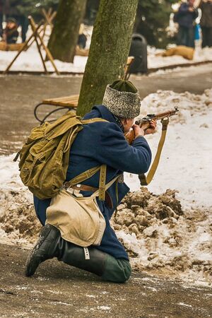 Lviv, Ukraine - January 29, 2017: Military historical reconstruction battle of Kruty . Red army soldiers defending position  Lviv, Ukraine.のeditorial素材