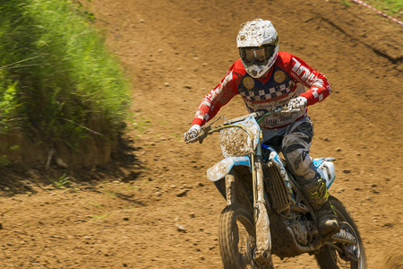Lviv, Ukraine - May 20 2018:  Open Cup of Lviv on the motocross track Mayorovka. Unknown motorcycle racer overcomes motocross track in the fight for the championship.のeditorial素材