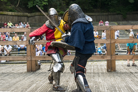 Lviv , Ukraine â august , 04, 2018:  Festival of medieval history and knight duels in the city park in Lviv.Knights fight in group battlesのeditorial素材