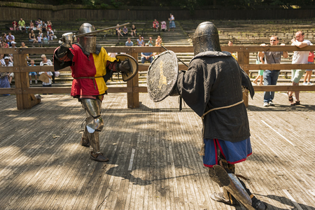 Lviv , Ukraine â august , 04, 2018:  Festival of medieval history and knight duels in the city park in Lviv.Knights fight in group battlesのeditorial素材