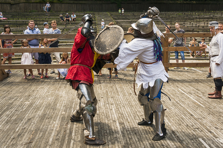 Lviv , Ukraine â august , 04, 2018:  Festival of medieval history and knight duels in the city park in Lviv.Knights fight in group battlesのeditorial素材