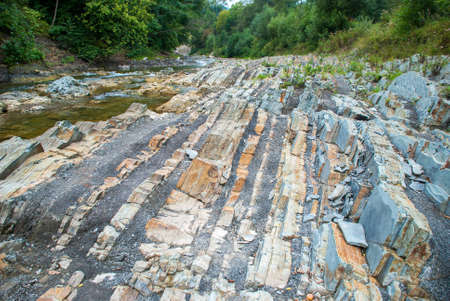 Layers of sedimentary sandstone rock.の写真素材