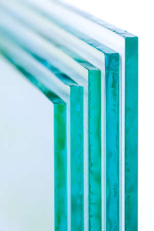 Sheets of Factory manufacturing tempered clear float glass panels cut to size.の写真素材