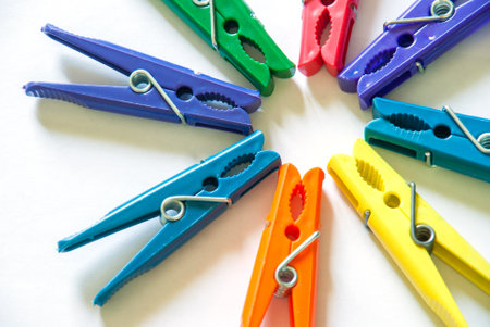 Color clothes-peg isolated on white backgroundの写真素材