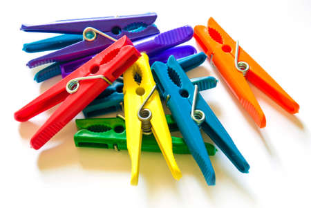 Color clothes-peg isolated on white backgroundの写真素材