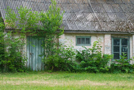 Abandoned wooden house in the village.の写真素材