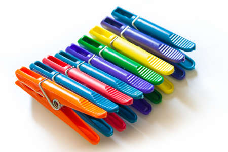 Color clothes-peg isolated on white backgroundの写真素材