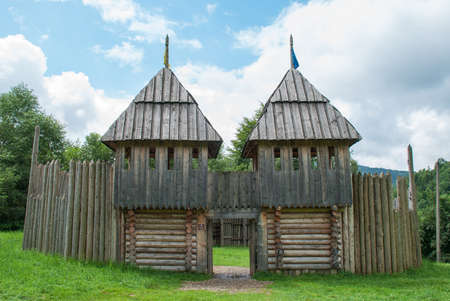 Wooden fortress towers, reconstruction of old battles, forest lawn.の写真素材