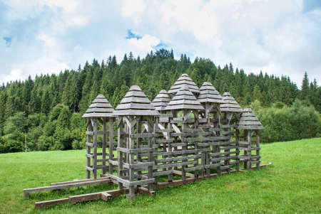 Wooden fortress towers, reconstruction of old battles, forest lawn.の写真素材