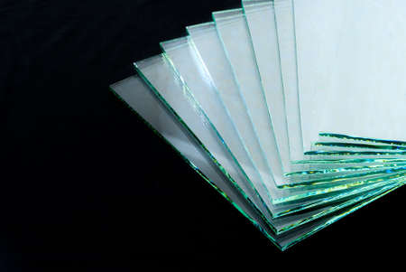Sheets of Factory manufacturing tempered clear float glass panels cut to size.の写真素材