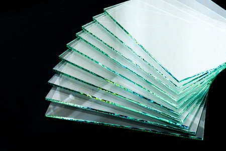 Sheets of Factory manufacturing tempered clear float glass panels cut to size.の写真素材
