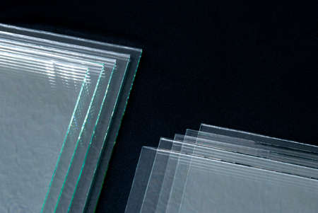 Sheets of Factory manufacturing tempered clear float glass panels cut to size.の写真素材