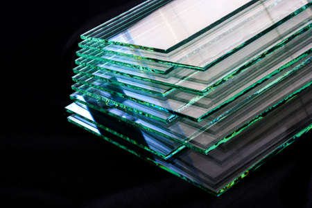 Sheets of Factory manufacturing tempered clear float glass panels cut to size.の写真素材