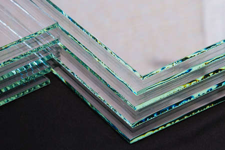 Sheets of Factory manufacturing tempered clear float glass panels cut to size.の写真素材